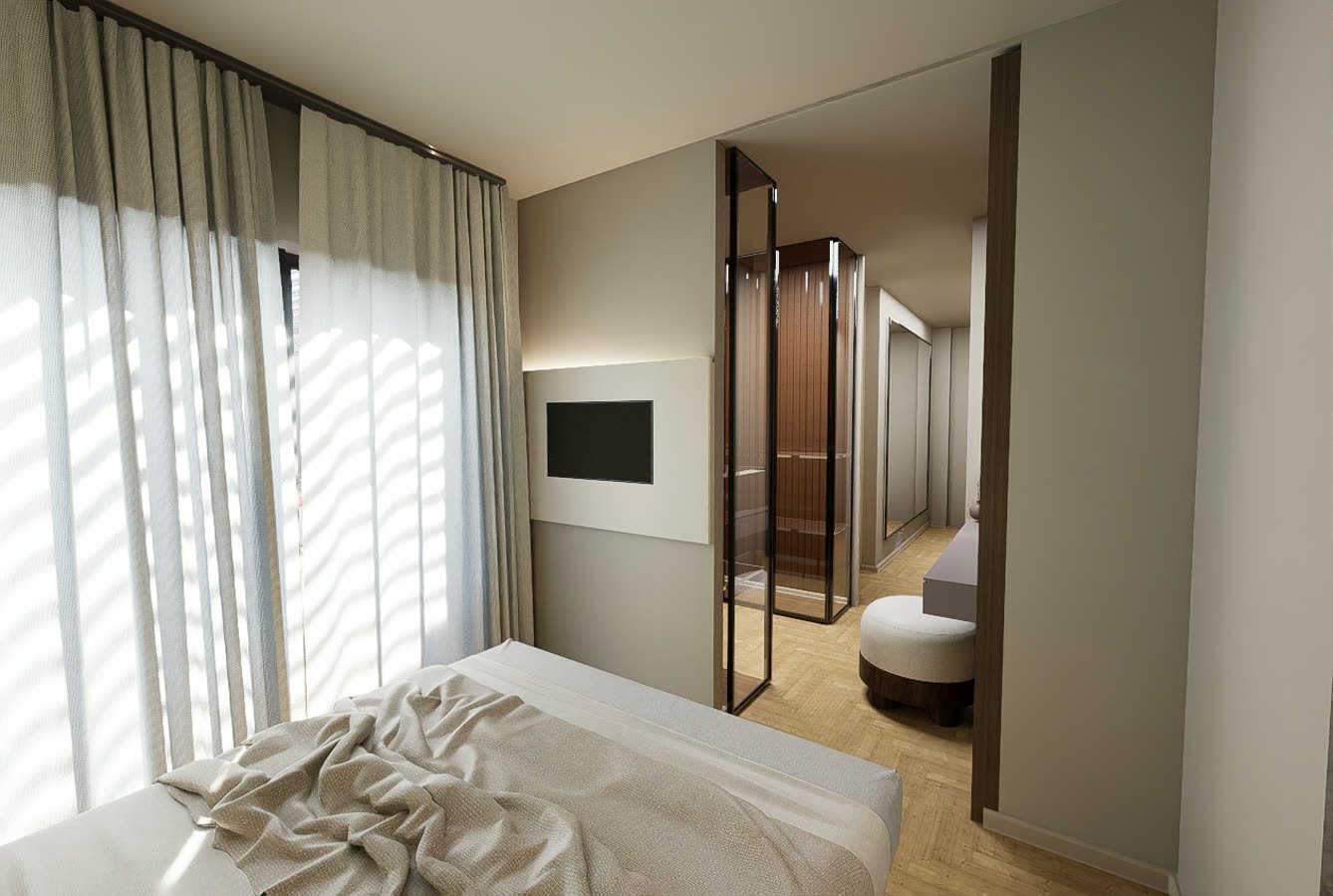 Camera con televisore a parete e vetrata verso il bagno